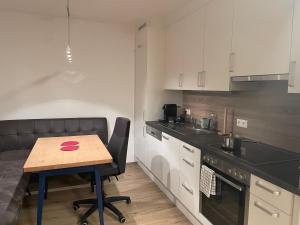 Kjøkken eller kjøkkenkrok på Ruhiges Appartement im Grünen