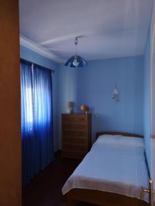Postel nebo postele na pokoji v ubytování Villa Poseidonia Punta Zeza (Lavrio) by the beach