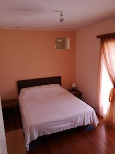 Postel nebo postele na pokoji v ubytování Villa Poseidonia Punta Zeza (Lavrio) by the beach
