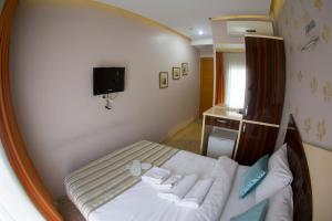 Postel nebo postele na pokoji v ubytování Ottoman Time Hotel