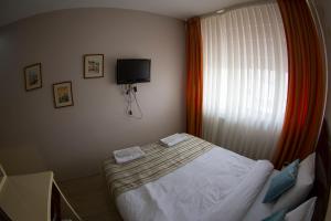 Postel nebo postele na pokoji v ubytování Ottoman Time Hotel