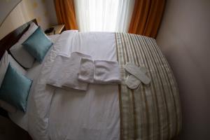 Postel nebo postele na pokoji v ubytování Ottoman Time Hotel