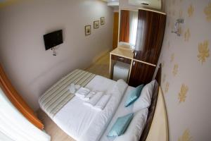 Postel nebo postele na pokoji v ubytování Ottoman Time Hotel