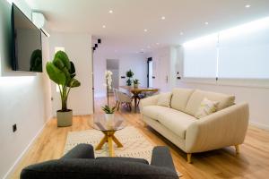 Telewizja i/lub zestaw kina domowego w obiekcie Laguna Home & Suites