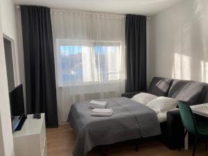 Posteľ alebo postele v izbe v ubytovaní Frýdecká Apartments