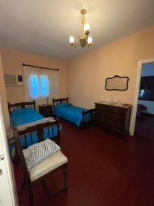 Katil atau katil-katil dalam bilik di Casa excelente ubicación con cochera y 2 baños