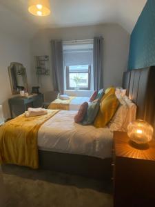 Postel nebo postele na pokoji v ubytování Woodquay House + 24 fotografií