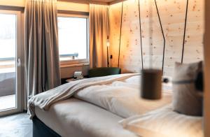 Vuode tai vuoteita majoituspaikassa LARET private Boutique Hotel - Adults only