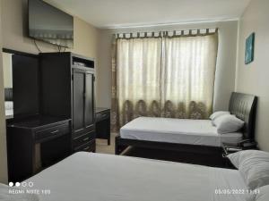 Postel nebo postele na pokoji v ubytování Hotel Marvento II + 24 fotografií