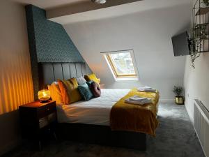 Postel nebo postele na pokoji v ubytování Woodquay House