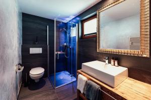 Kylpyhuone majoituspaikassa LARET private Boutique Hotel - Adults only