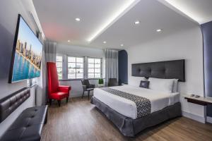 Postel nebo postele na pokoji v ubytování Kent Hotel + 37 fotografií