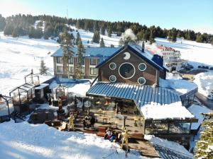 an aerial view of a building in the snow at Oksijen Zone Hotel & Spa in Uludag