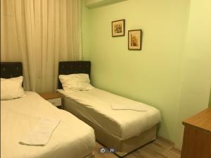 Postel nebo postele na pokoji v ubytování Ottoman Time Hotel