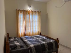 Uma cama ou camas num quarto em Pullad