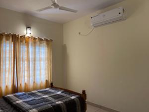 Uma cama ou camas num quarto em Pullad