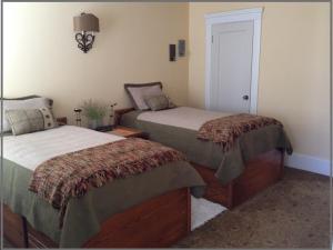 Ένα ή περισσότερα κρεβάτια σε δωμάτιο στο Beautiful Edwardian Victorian Homestay B&B