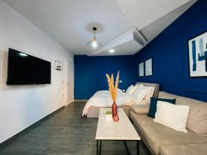 Et tv og/eller underholdning på Blloku Area Modern App - THE NEST