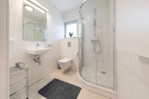 Koupelna v ubytování Baltique Apartment - Silamar Zaciszna + 12 fotografií