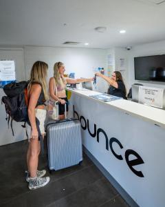 a group of women standing at a store counter at Bounce Cairns in Cairns