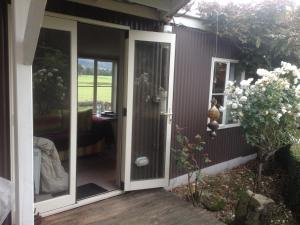 Aed väljaspool majutusasutust Tahakopa Lodge - Cabin