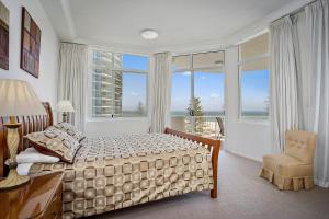 Ένα ή περισσότερα κρεβάτια σε δωμάτιο στο Kirra Beach Apartments +106 φωτογραφίες