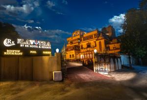 a building with a sign that reads la alameda my real hotel a resort at The Lavitra Udaipur in Udaipur