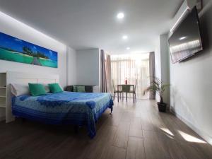 Ένα ή περισσότερα κρεβάτια σε δωμάτιο στο Hercules Suite +4 φωτογραφίες