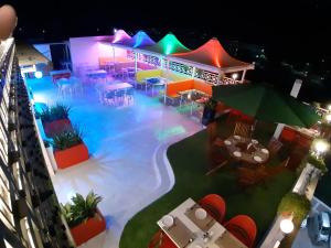an overhead view of a pool at night at Hotel The Grand Piano - Best Business Hotel in Patan in Pātan