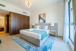Postel nebo postele na pokoji v ubytování Charming Two Bedroom in Madinat Jumeirah Living