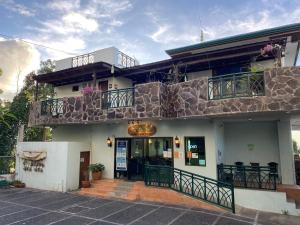 a building with a balcony on top of it at MC Mountain Home in Tagaytay
