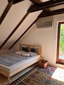 Posteľ alebo postele v izbe v ubytovaní Bencze Pincze Badacsony Hill