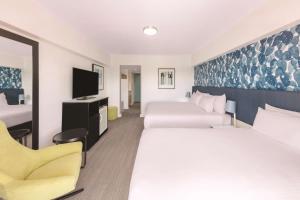TV a/nebo společenská místnost v ubytování Vibe Hotel Gold Coast