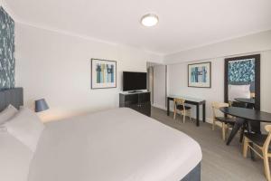 Postel nebo postele na pokoji v ubytování Vibe Hotel Gold Coast