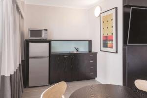 Kuchyň nebo kuchyňský kout v ubytování Vibe Hotel Gold Coast