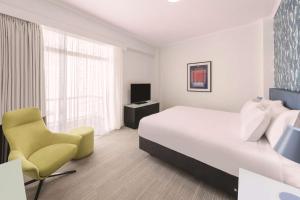 TV a/nebo společenská místnost v ubytování Vibe Hotel Gold Coast