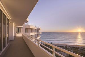 a view of the ocean from the balcony of a hotel at Rendezvous Hotel Perth Scarborough in Perth