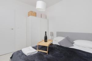 Posteľ alebo postele v izbe v ubytovaní Gdynia Nasypowa Apartments with Parking by Noclegi Renters