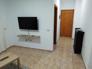 TV a/nebo společenská místnost v ubytování THREE BEDROOM APARTAMENT II NEAR SANTA CRUZ