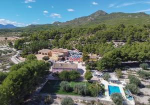 an aerial view of a home in the mountains at Rapia. Casa Azul 6 in Los Granadicos