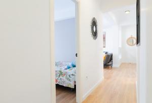 Postel nebo postele na pokoji v ubytování Malagaflat Design Apartment 3 Bedrooms City Centre