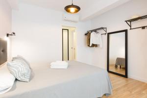 Postel nebo postele na pokoji v ubytování Malagaflat Design Apartment 3 Bedrooms City Centre