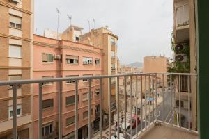 einen Blick vom Balkon eines Gebäudes in der Unterkunft Malagaflat Design Apartment 3 Bedrooms City Centre in Málaga