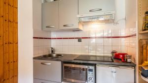Cucina o angolo cottura di Les Sitelles - 18 - Belle vue Appart 6 pers