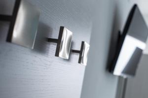 a close up of a lightswitch on a wall at Hotel Platinum in Rimini