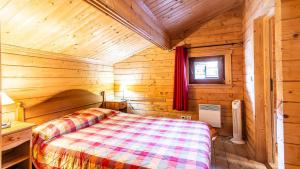 Łóżko lub łóżka w pokoju w obiekcie Bois de Champelle- 94 Magnifique Chalet-10 pers