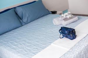 
Ein Bett oder Betten in einem Zimmer der Unterkunft Hotel Platinum

