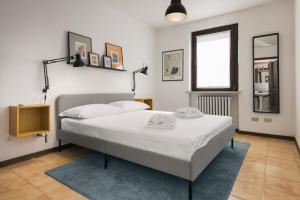Posteľ alebo postele v izbe v ubytovaní Flats4rent Sabotino