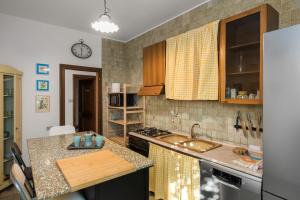 Kuchyňa alebo kuchynka v ubytovaní Flats4rent Sabotino
