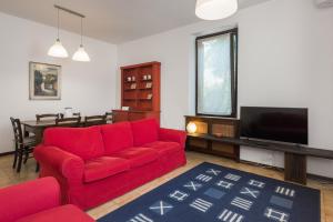 Televízia a/alebo spoločenská miestnosť v ubytovaní Flats4rent Sabotino